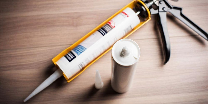 How To Remove A Tube Of Caulk From A Caulking Gun?